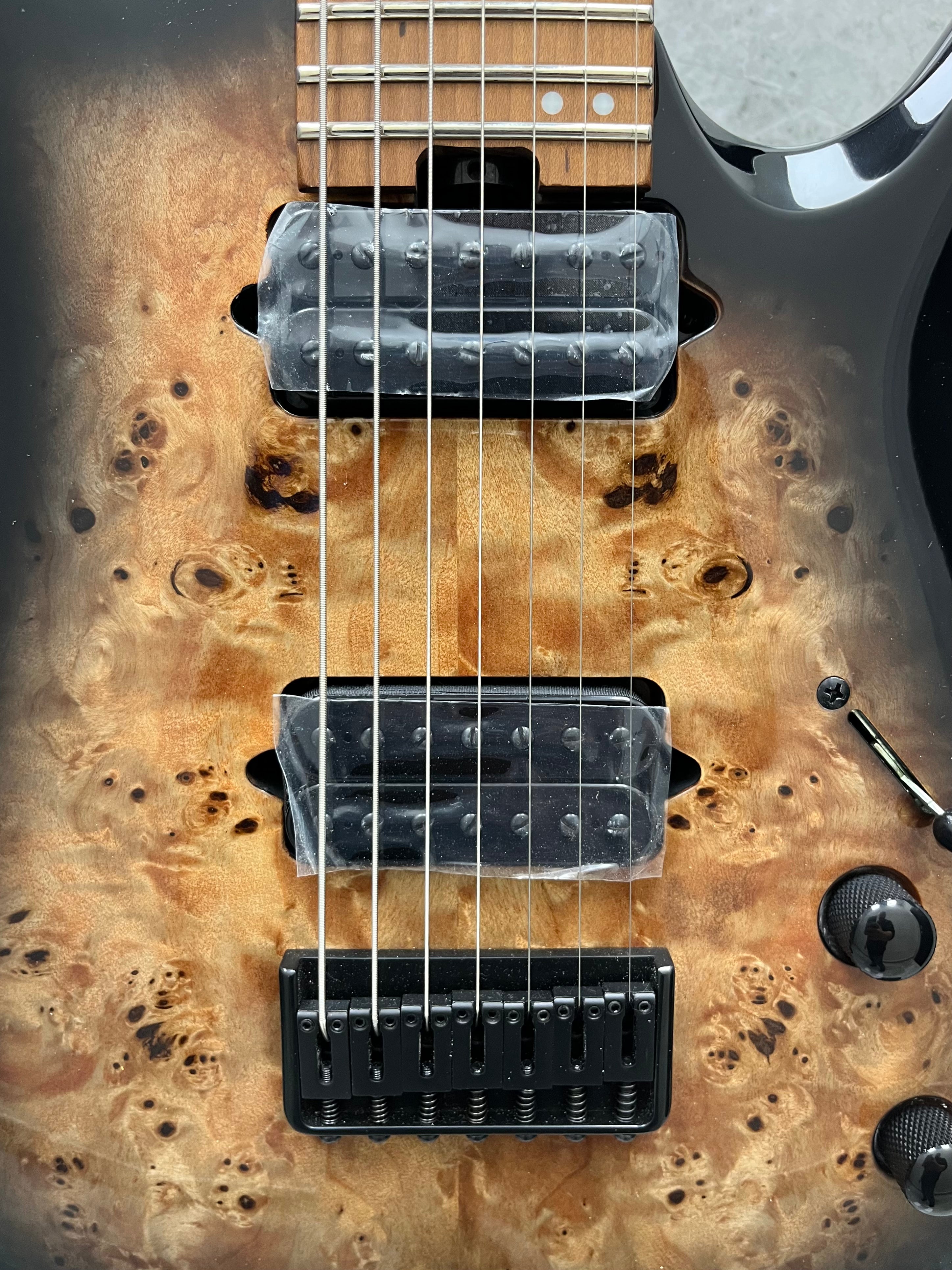 Jackson Pro Series Signature Misha Mansoor 7 STRING Juggernaut HT7P, Caramelized Maple Fingerboard, Black Burst Burl 2914007557 SERIAL NUMBER ICJ2416091 - 7.2 LBS