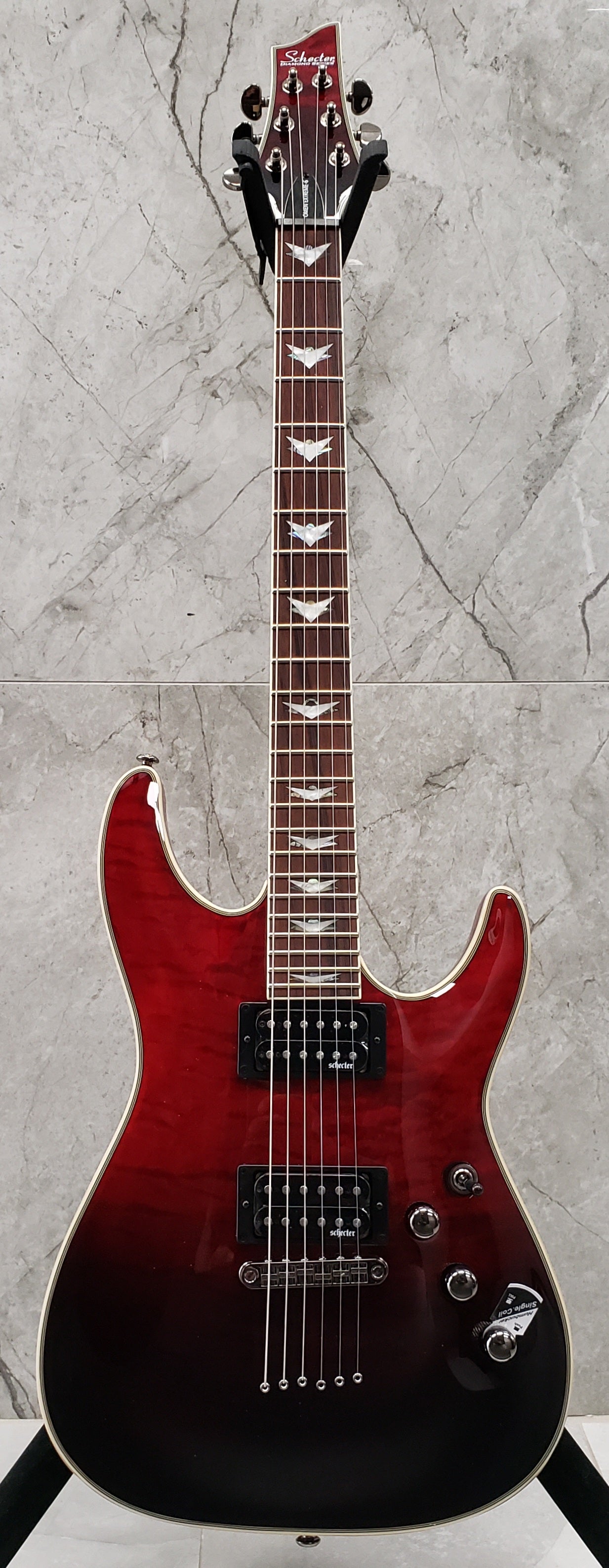 Schecter Omen Extreme 6 String in Blood Burst 2034-SHC