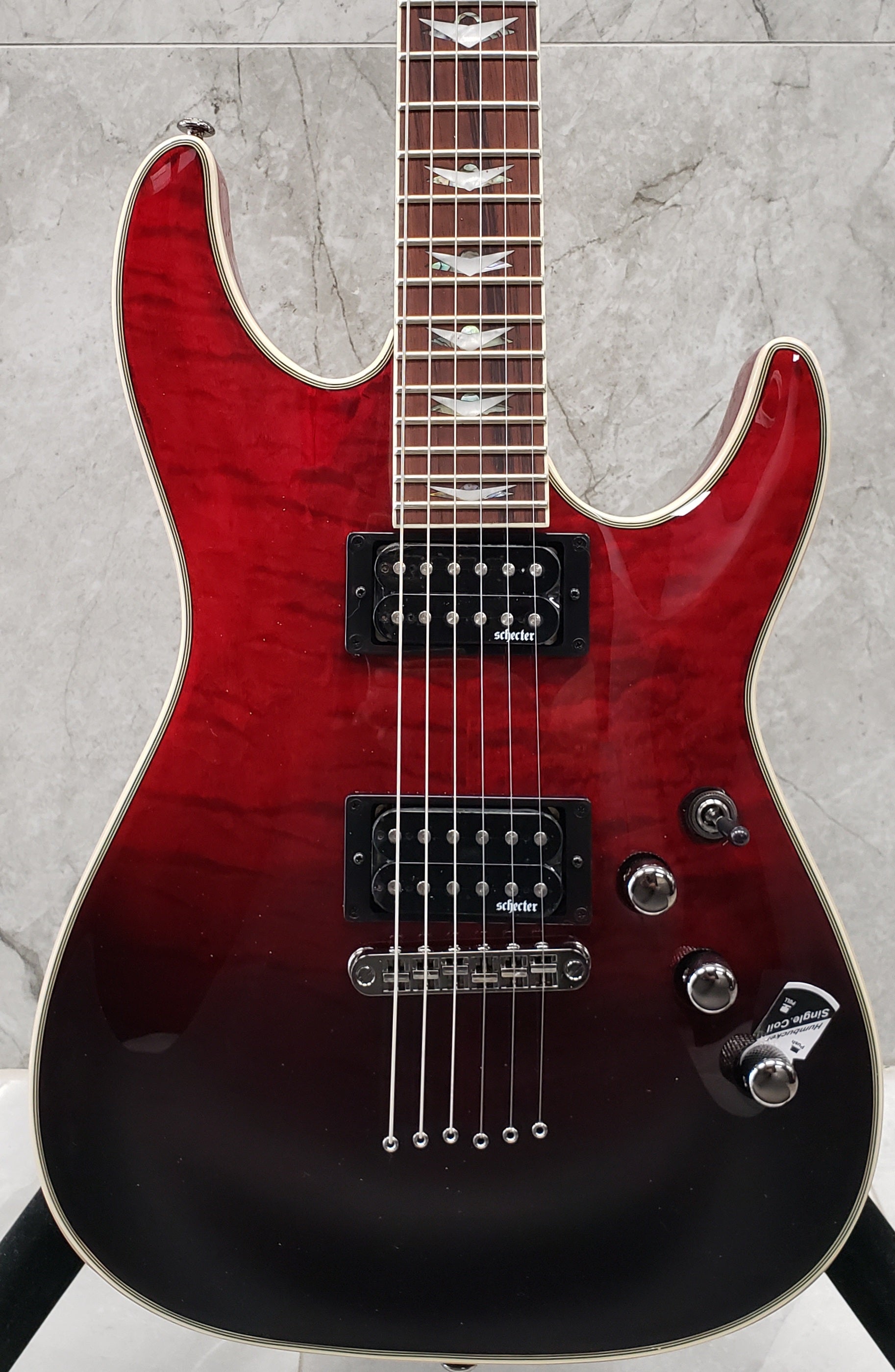 Schecter Omen Extreme 6 String in Blood Burst 2034-SHC