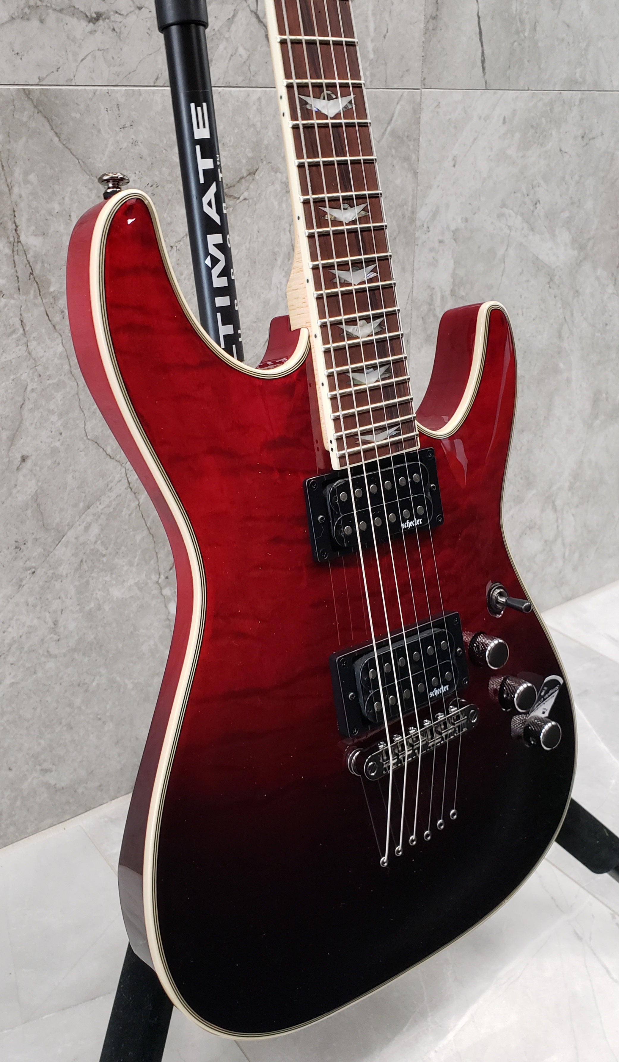 Schecter Omen Extreme 6 String in Blood Burst 2034-SHC